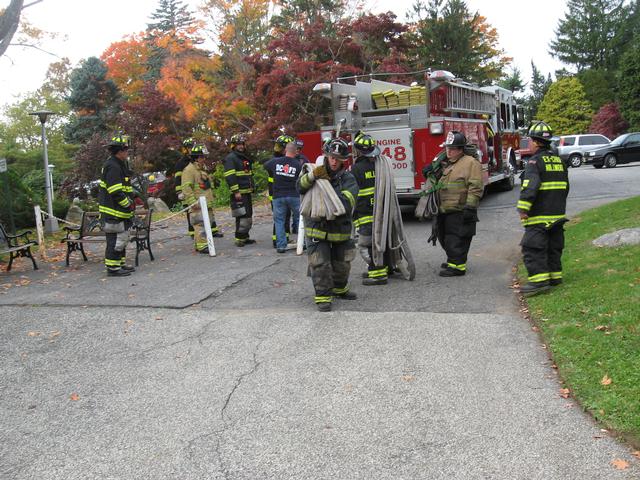 Mark Stabile and J.T. Camp advance hose-lines into Maryknoll - Photo Courtesy of JT Camp