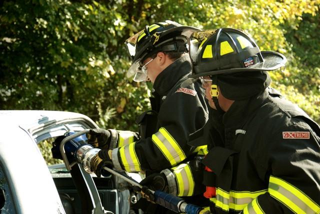 Lt. Greg Lombardi and Firefighter Brian Moran working with the Jaws of Life